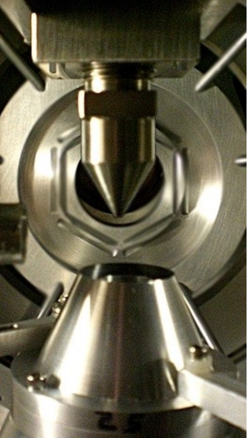 The JENSA jet nozzle and gas receivers inside of the target chamber.