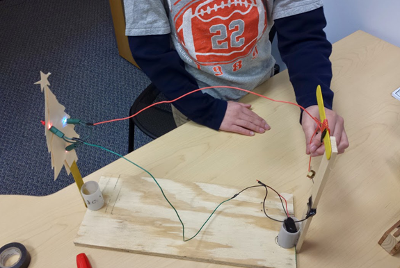 Successful completion of a pendulum switch circuit to light a holiday decoration.