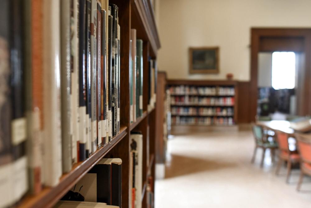 Journals on a bookshelf