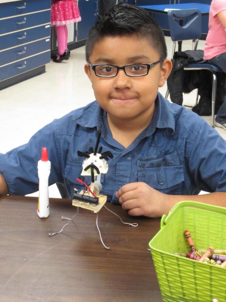 Boy working with science