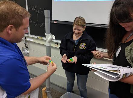 Magnetic marble activity with teachers